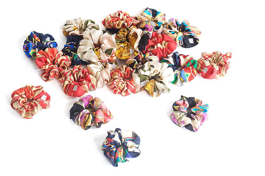A collection of scrunchies made from vintage silk scarves